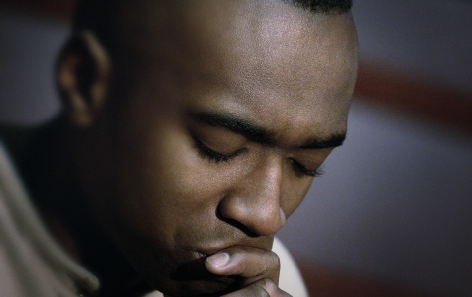 black man praying